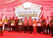 Polda Sulut Serahkan 200 Paket Bansos kepada Pengemudi Ojol